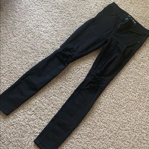 Black jeans with holes